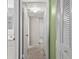 Hallway with carpet leading to a bathroom and bedrooms at 5095 Bay Ne St # 114, St Petersburg, FL 33703