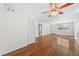 Inviting living room features hardwood floors, a ceiling fan, and lots of natural light at 5095 Bay Ne St # 114, St Petersburg, FL 33703