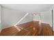 Neutral living room boasts hardwood floors, a ceiling fan, and great natural light at 5095 Bay Ne St # 114, St Petersburg, FL 33703