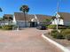 Condominium community center with parking and landscaping at 455 Alt 19 S # 21, Palm Harbor, FL 34683