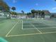 Well-maintained tennis and pickleball court at 455 Alt 19 S # 21, Palm Harbor, FL 34683