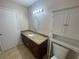 Bathroom with granite countertop and toilet at 455 Alt 19 S # 21, Palm Harbor, FL 34683