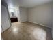 Bright bedroom with tile floors and access to bathroom at 455 Alt 19 S # 21, Palm Harbor, FL 34683