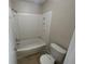 Clean bathroom with bathtub, toilet and shower at 455 Alt 19 S # 21, Palm Harbor, FL 34683