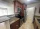 Kitchen with granite countertops and stainless steel appliances at 455 Alt 19 S # 21, Palm Harbor, FL 34683