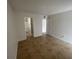 Spacious bedroom with tile floors and two entrances at 455 Alt 19 S # 21, Palm Harbor, FL 34683