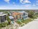Beachfront building with private pools and lush landscaping at 19820 Gulf Blvd # 401, Indian Shores, FL 33785