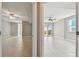 Open and bright living room with tile floors and access to balcony at 19820 Gulf Blvd # 401, Indian Shores, FL 33785