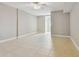 Bright bedroom with tile floors and ceiling fan at 19820 Gulf Blvd # 401, Indian Shores, FL 33785