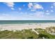 Beachfront view with white sand and ocean at 19820 Gulf Blvd # 401, Indian Shores, FL 33785