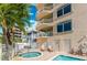 Inviting pool and spa area with lounge chairs, perfect for relaxation at 19820 Gulf Blvd # 401, Indian Shores, FL 33785