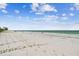 Beachfront view of shoreline with ocean and beach at 19820 Gulf Blvd # 401, Indian Shores, FL 33785