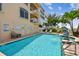 Refreshing community pool and spa, steps from the building at 19820 Gulf Blvd # 401, Indian Shores, FL 33785