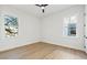 Bedroom with hardwood floors, white walls, and abundant natural light at 135 48Th Ave, St Petersburg, FL 33703