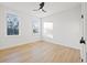Bright bedroom with hardwood floors, large windows, and natural light at 135 48Th Ave, St Petersburg, FL 33703