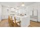 Beautiful kitchen featuring an island with seating, modern appliances, and ample counter space, ideal for Gathering meals at 135 48Th Ave, St Petersburg, FL 33703