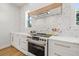 Stylish kitchen with sleek countertops, custom cabinetry, and high-end appliances offering both functionality and elegance at 135 48Th Ave, St Petersburg, FL 33703