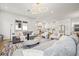 Bright and open living room featuring a modern design, stylish furniture, and an abundance of natural light at 135 48Th Ave, St Petersburg, FL 33703