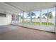 Sunroom with view of backyard and sliding glass doors at 3543 Seffner Dr, Holiday, FL 34691