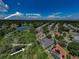 Aerial view of the house, Gulf of Mexico and the conservation area at 957 Westwinds Blvd, Tarpon Springs, FL 34689