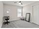 Cozy bedroom featuring a built-in workspace and ample closet space at 102 Eagle Summit Dr, Ruskin, FL 33570