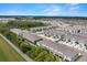 Aerial view of townhouses and community amenities at 2926 Suncoast Plains Dr, Odessa, FL 33556