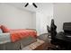 Bedroom with a bed, desk, and chair, ideal for a home office at 2926 Suncoast Plains Dr, Odessa, FL 33556