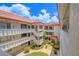 Condo courtyard with tropical landscaping at 2612 Pearce Dr # 306, Clearwater, FL 33764