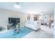 Spacious living room with comfortable seating and a large flat-screen TV at 2612 Pearce Dr # 306, Clearwater, FL 33764