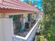 Private balcony with seating and plants, ideal for outdoor relaxation at 2612 Pearce Dr # 306, Clearwater, FL 33764