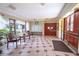 Building lobby with seating area, mailboxes and tiled floors at 2612 Pearce Dr # 306, Clearwater, FL 33764