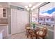 Bright kitchen nook with a glass table and chairs, perfect for casual dining at 2612 Pearce Dr # 306, Clearwater, FL 33764