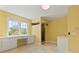 Bright bathroom with marble counters, built-in desk and a tile walk-in shower at 1768 Lago Vista, Palm Harbor, FL 34685