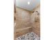 Shower featuring tile walls, a bench, and pebble floor at 1768 Lago Vista, Palm Harbor, FL 34685