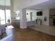 Community lounge with bar, herringbone floors, and modern light fixtures at 920 N Osceola Ave # 201, Clearwater, FL 33755