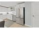 Stainless steel appliances and white cabinets in this modern kitchen at 920 N Osceola Ave # 201, Clearwater, FL 33755
