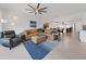Open living room with sectional sofa, dining area, and kitchen view at 920 N Osceola Ave # 201, Clearwater, FL 33755