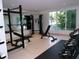 Modern gym with weightlifting equipment and large windows at 920 N Osceola Ave # 201, Clearwater, FL 33755