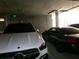 Secure parking garage with designated spaces at 920 N Osceola Ave # 201, Clearwater, FL 33755