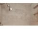 Updated shower with neutral tile and modern fixtures at 1655 S Highland Ave # B216, Clearwater, FL 33756