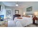 Bright bedroom with a comfortable bed and ample closet space at 1655 S Highland Ave # B216, Clearwater, FL 33756