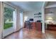 Home office with desk, chair, and built-in shelving at 1655 S Highland Ave # B216, Clearwater, FL 33756