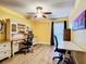 Home office with two desks and built-in shelving at 225 Country Club Dr # E246, Largo, FL 33771