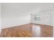 Bright living room with hardwood floors and large window at 5080 Locust Ne St # 329, St Petersburg, FL 33703