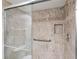 Bathroom with a large shower, tiled walls, and glass enclosure at 5080 Locust Ne St # 329, St Petersburg, FL 33703
