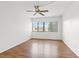 Bright bedroom with wood flooring and ceiling fan at 5080 Locust Ne St # 329, St Petersburg, FL 33703