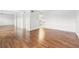 Living room with hardwood floors and view of kitchen at 5080 Locust Ne St # 329, St Petersburg, FL 33703