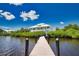 Private dock leading to a waterfront home at 13064 Via Flavia, Placida, FL 33946