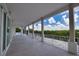 Spacious covered patio overlooking the pool and backyard at 13064 Via Flavia, Placida, FL 33946