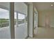 Bright and airy living room with sliding glass doors to patio at 13064 Via Flavia, Placida, FL 33946